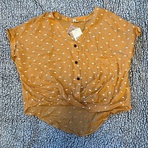 a.n.a. Gold tee Never Worn!